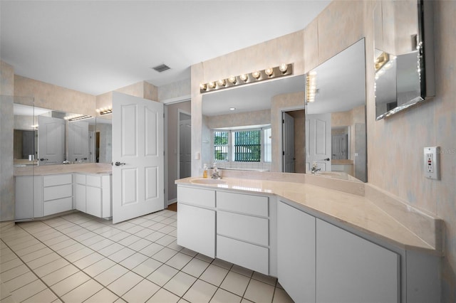 full bath with tile patterned floors, visible vents, and vanity