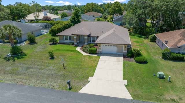 birds eye view of property with a residential view