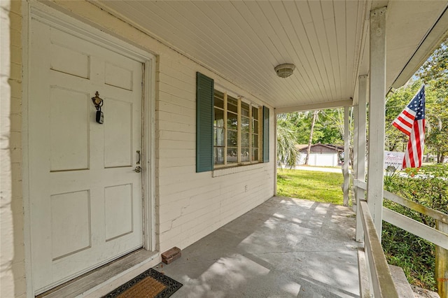 608 SE 31st Ter, Ocala, FL 34471 - view of exterior entry featuring a porch