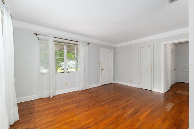 608 SE 31st Ter, Ocala, FL 34471 - empty room featuring baseboards and hardwood / wood-style floors