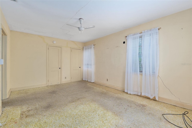 608 SE 31st Ter, Ocala, FL 34471 - empty room featuring a ceiling fan, carpet flooring, and baseboards
