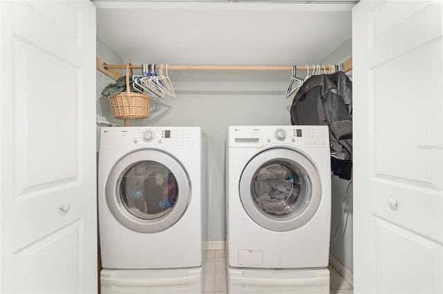 washroom with laundry area and separate washer and dryer