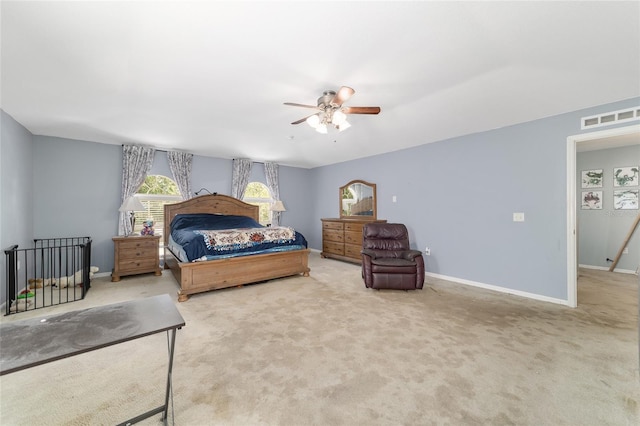 bedroom featuring carpet flooring, baseboards, visible vents, and ceiling fan