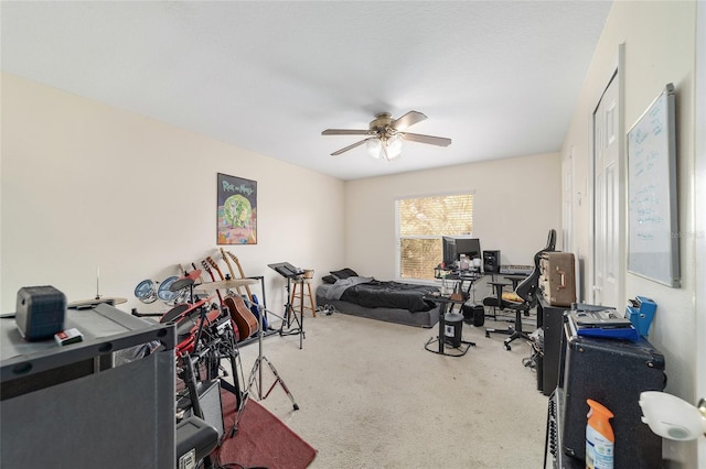 interior space featuring ceiling fan and carpet