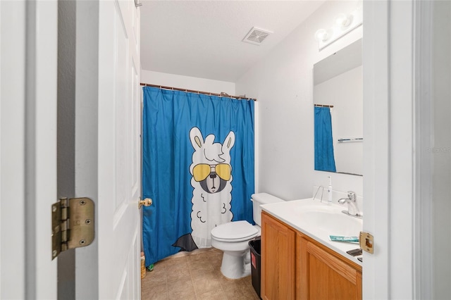 full bathroom featuring vanity, toilet, tile patterned floors, a shower with curtain, and visible vents