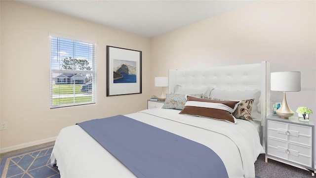 bedroom featuring carpet floors and baseboards