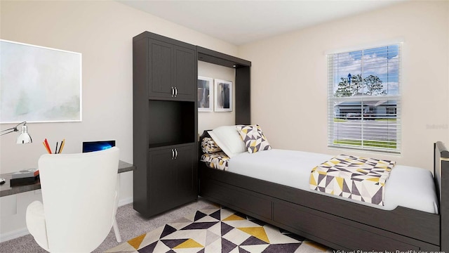 bedroom featuring light colored carpet