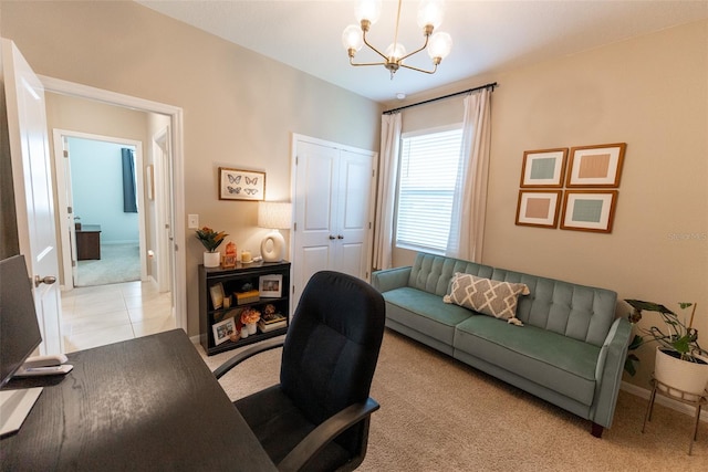 office area with an inviting chandelier and light carpet