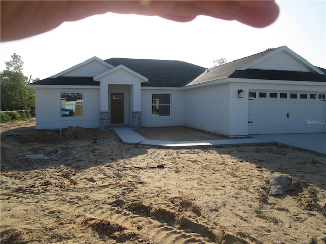 10409 SW 45th St, Ocala, FL 34481 - ranch-style home featuring an attached garage and driveway
