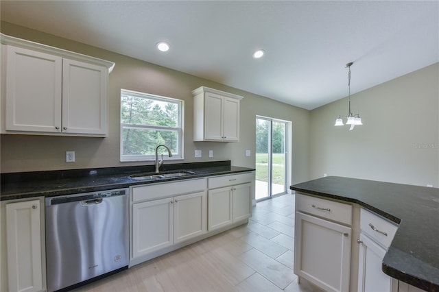 kitchen featuring recessed lighting, white cabinetry, a sink, dishwasher, and hanging light fixtures