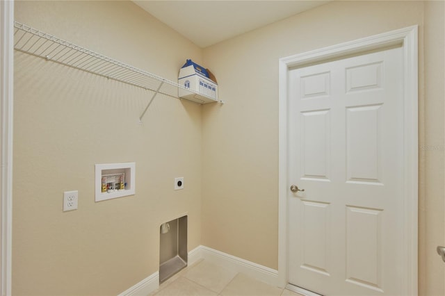 laundry room featuring hookup for an electric dryer, laundry area, baseboards, hookup for a washing machine, and light tile patterned flooring