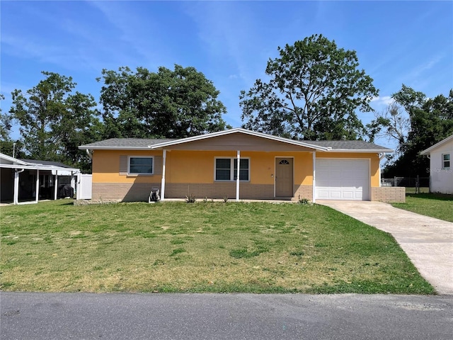 view of front of property with a garage, concrete driveway, a front yard, and brick siding