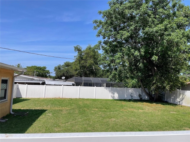 view of yard featuring a fenced backyard