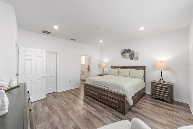 7706 SW 89th Ct, Ocala, FL 34481 - bedroom with light wood-type flooring, baseboards, and visible vents