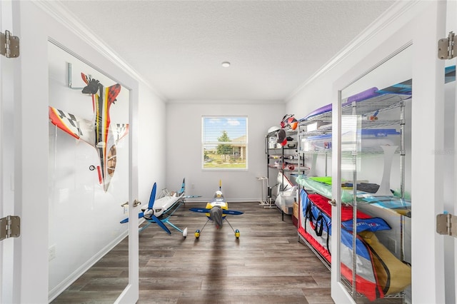 7706 SW 89th Ct, Ocala, FL 34481 - interior space featuring ornamental molding, a textured ceiling, baseboards, and wood finished floors