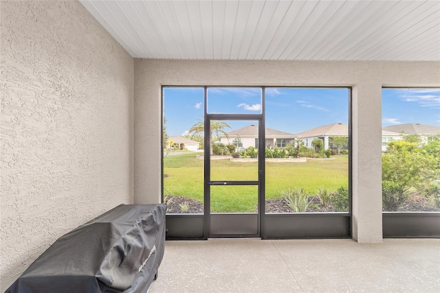 7706 SW 89th Ct, Ocala, FL 34481 - unfurnished sunroom featuring a residential view