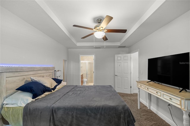 6306 Pecan Crse, Ocala, FL 34472 - bedroom featuring a raised ceiling, carpet floors, baseboards, a ceiling fan, and ensuite bath