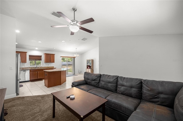 6306 Pecan Crse, Ocala, FL 34472 - living room with ceiling fan, lofted ceiling, light tile patterned floors, recessed lighting, and baseboards
