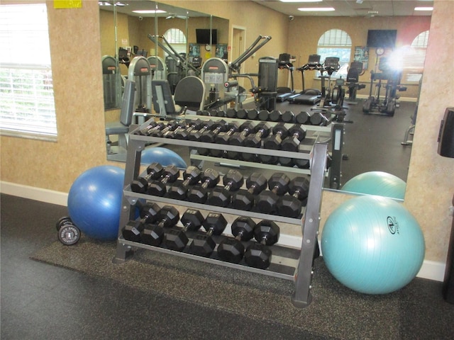 workout area with baseboards
