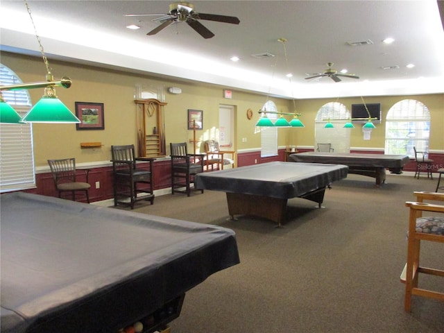 recreation room with carpet floors, a ceiling fan, pool table, and a wainscoted wall