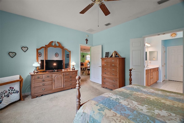 bedroom featuring light colored carpet, ceiling fan, and visible vents