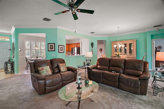 living room featuring visible vents, ornamental molding, carpet, and ceiling fan with notable chandelier