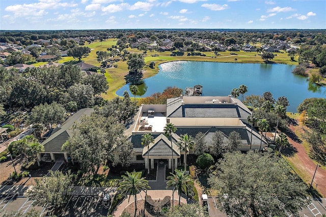 birds eye view of property featuring a water view, view of golf course, and a residential view