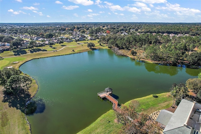 bird's eye view with a water view, view of golf course, and a residential view