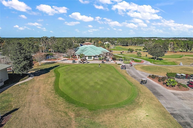 bird's eye view with view of golf course