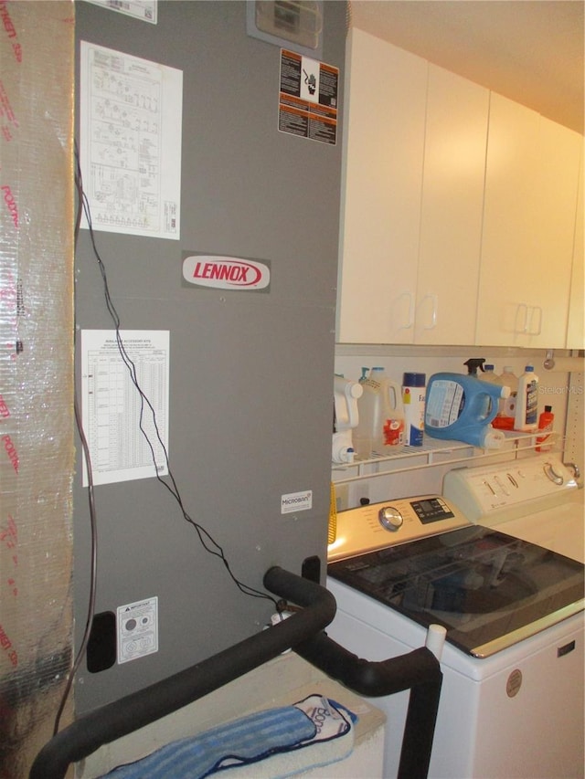 kitchen with heating unit and washer / dryer