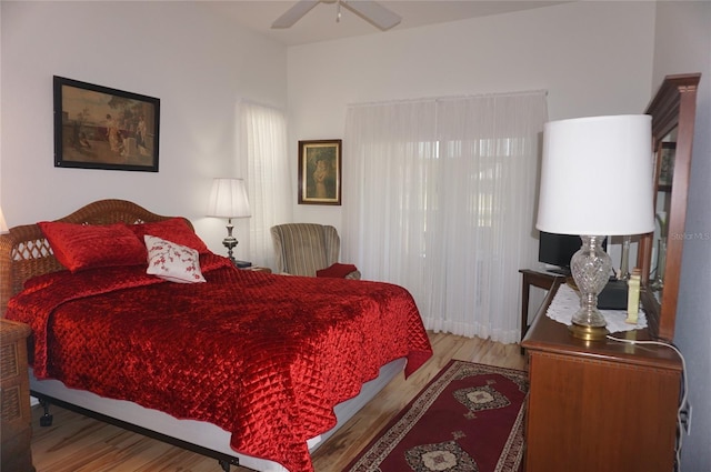 bedroom featuring a ceiling fan and wood finished floors