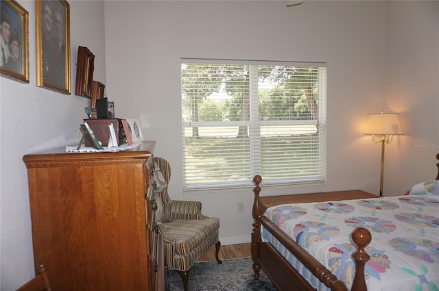 bedroom featuring wood finished floors