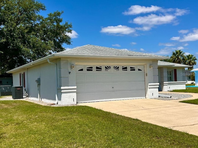 view of side of property featuring stucco siding, central AC unit, a garage, and concrete driveway
