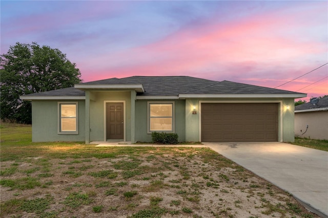 69 Juniper Trail Loop, Ocala, FL 34480 - ranch-style house featuring driveway, stucco siding, and an attached garage
