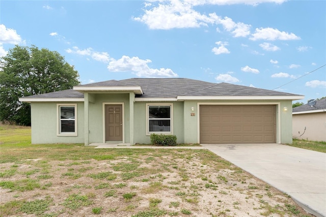 69 Juniper Trail Loop, Ocala, FL 34480 - single story home featuring concrete driveway, an attached garage, and stucco siding