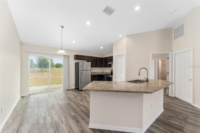 69 Juniper Trail Loop, Ocala, FL 34480 - kitchen featuring a sink, wood finished floors, visible vents, and appliances with stainless steel finishes