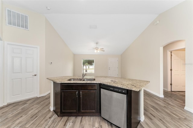 69 Juniper Trail Loop, Ocala, FL 34480 - kitchen featuring a sink, visible vents, dishwasher, light wood-style floors, and lofted ceiling