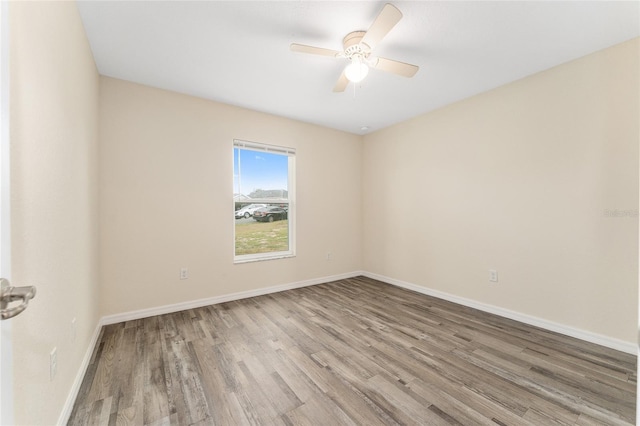69 Juniper Trail Loop, Ocala, FL 34480 - empty room featuring a ceiling fan, wood finished floors, and baseboards