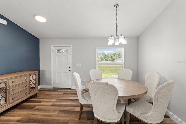 9 Walnut Run, Ocala, FL 34480 - dining area with a notable chandelier, baseboards, and wood finished floors