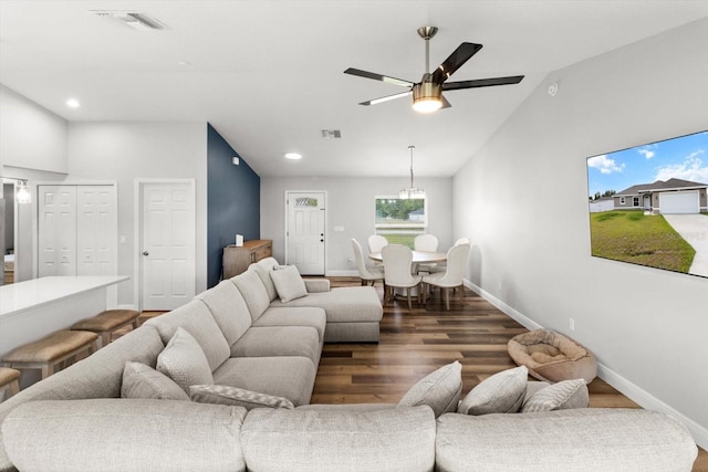 9 Walnut Run, Ocala, FL 34480 - living room with lofted ceiling, baseboards, visible vents, and wood finished floors
