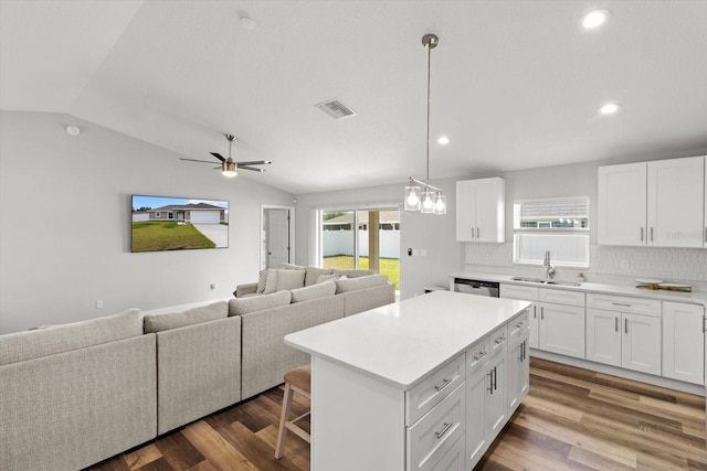 9 Walnut Run, Ocala, FL 34480 - kitchen with a sink, open floor plan, plenty of natural light, dishwasher, and a kitchen island