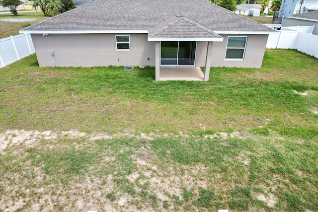 9 Walnut Run, Ocala, FL 34480 - rear view of property with a patio, roof with shingles, and a fenced backyard
