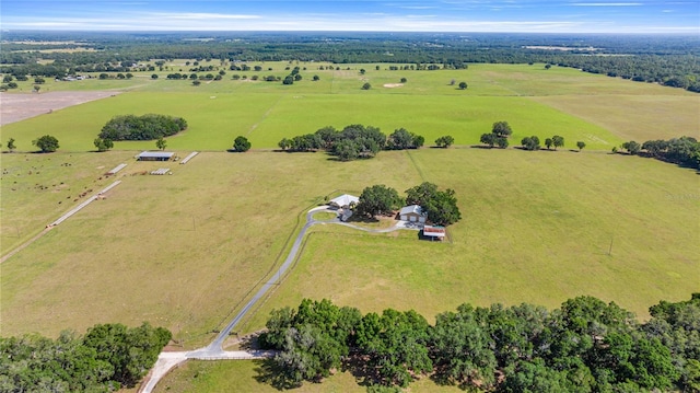 birds eye view of property featuring a rural view