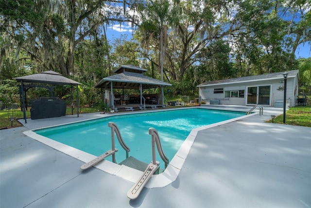 4710 SE 30th Ct, Ocala, FL 34480 - pool with a patio, a gazebo, an outdoor structure, and an exterior structure
