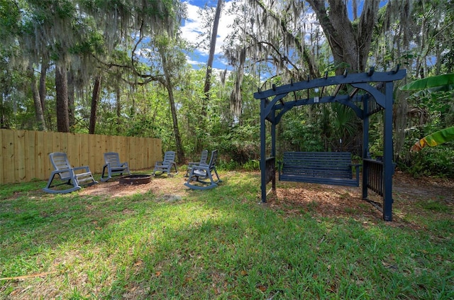 4710 SE 30th Ct, Ocala, FL 34480 - view of yard with a pergola and fence