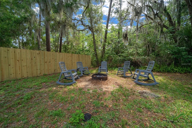 4710 SE 30th Ct, Ocala, FL 34480 - view of yard featuring fence and an outdoor fire pit