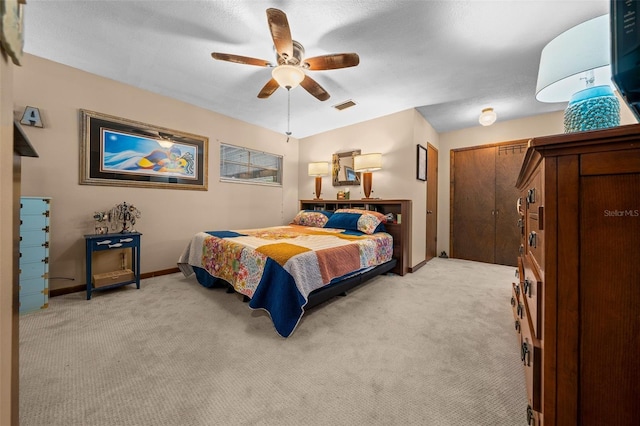 4710 SE 30th Ct, Ocala, FL 34480 - bedroom featuring ceiling fan, visible vents, light carpet, and baseboards
