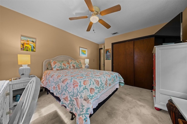 4710 SE 30th Ct, Ocala, FL 34480 - bedroom featuring a ceiling fan, light carpet, a closet, and visible vents