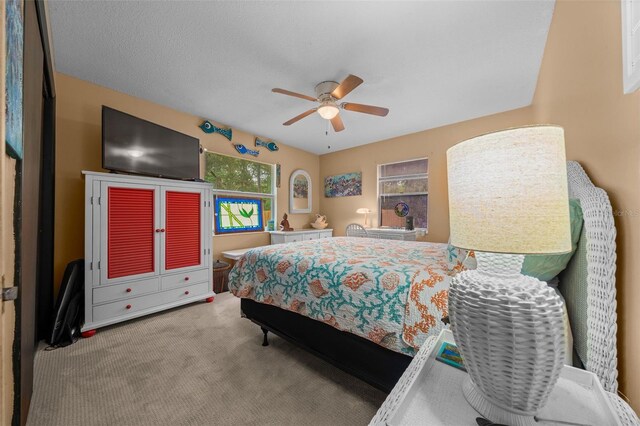 4710 SE 30th Ct, Ocala, FL 34480 - bedroom with carpet floors and ceiling fan