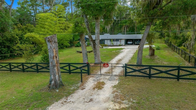 4710 SE 30th Ct, Ocala, FL 34480 - view of gate featuring a lawn and fence